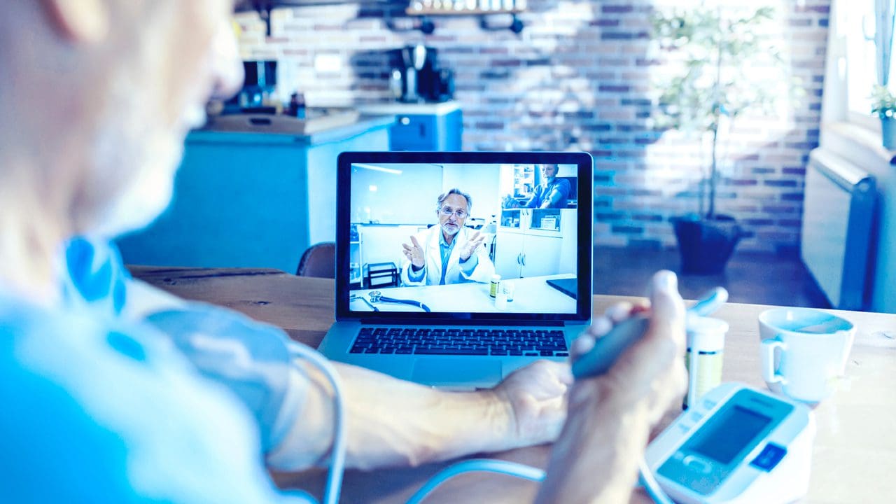 Man Consulting Doctor Remotely