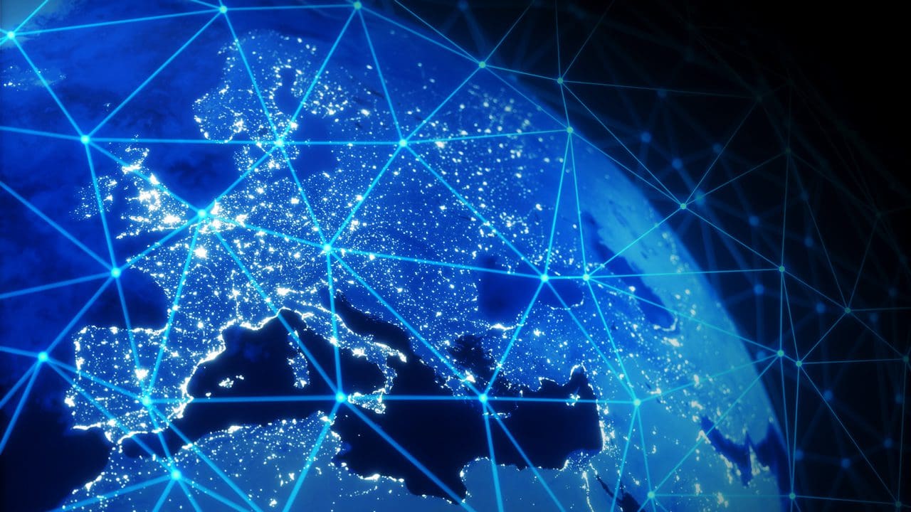 Image of a globe with data lines traveling between countries.