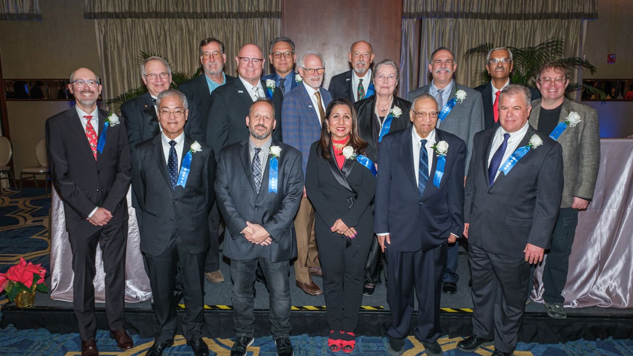 Recipients taking a group photo