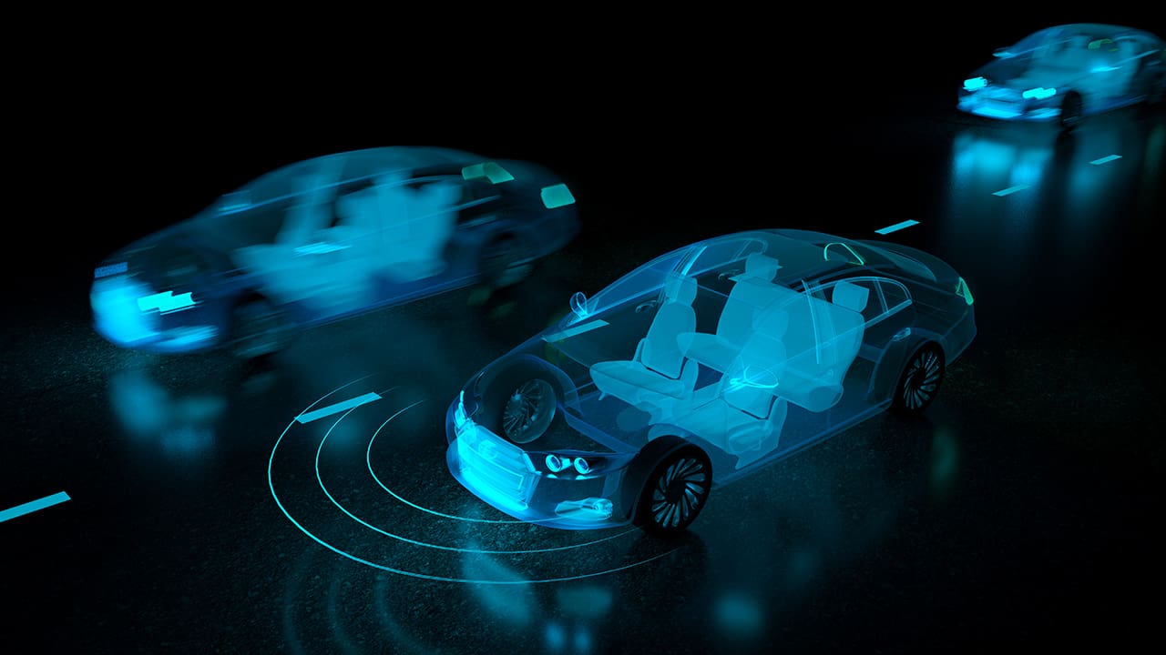 Three autonomous vehicles on the road.