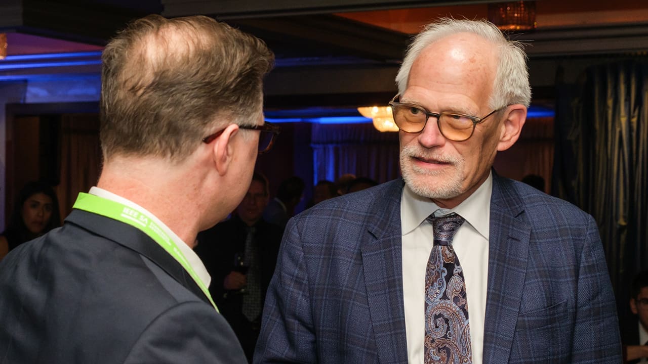 IEEE President Tom Coughlin speaking to a 2024 IEEE SA Standards Fellowship participant.