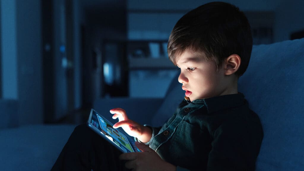 A child using a tablet computer.