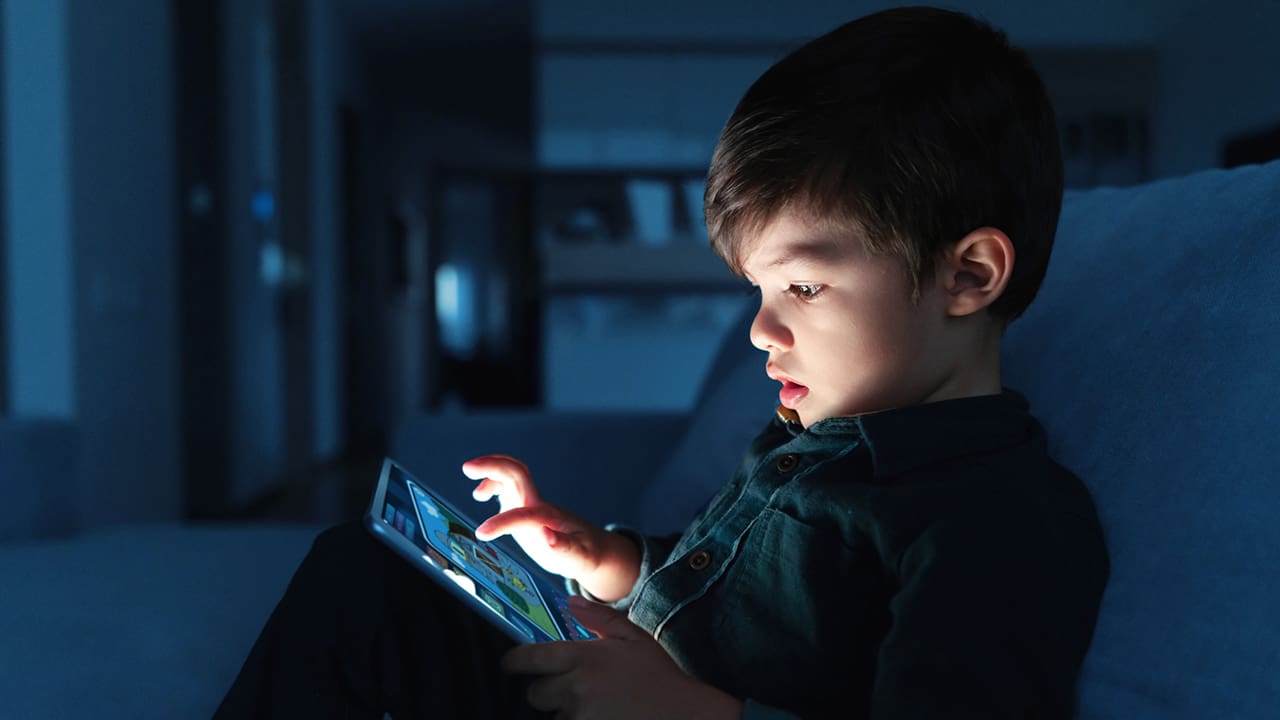 A child using a tablet computer.